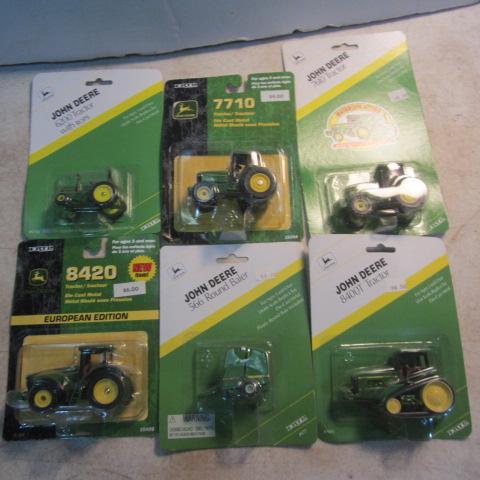 lot 203 image: John Deere Toy Tractors