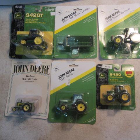 lot 204 image: John Deere Toy Tractors & Spreader