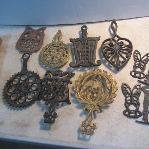 lot 214 image: Figural Trivets