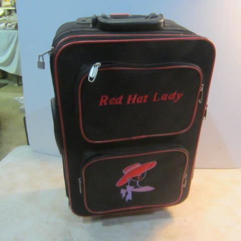 lot 250 image: Red Hat Lady Suitcase Set