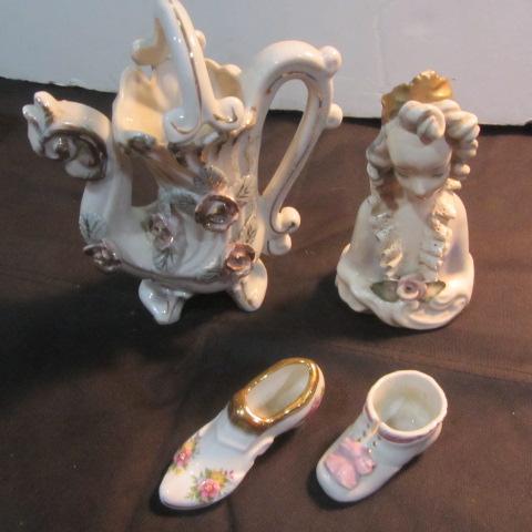 lot 283 image: Ceramic Watering Can, Figures, Shoes