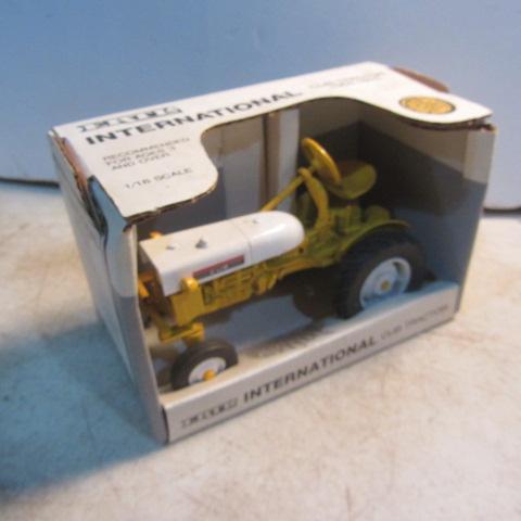 lot 64 image: Intl Cub Toy Tractor
