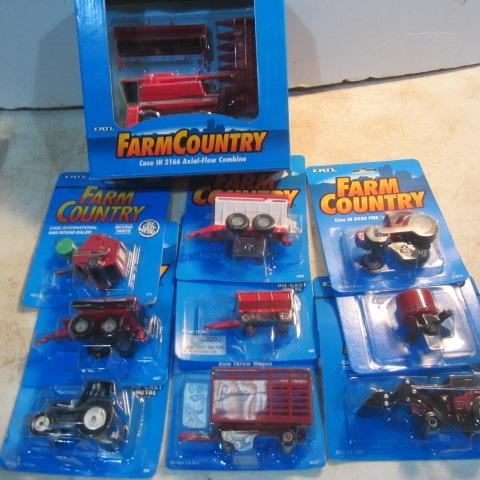 lot 84 image: Case Toy Tractors & Implements