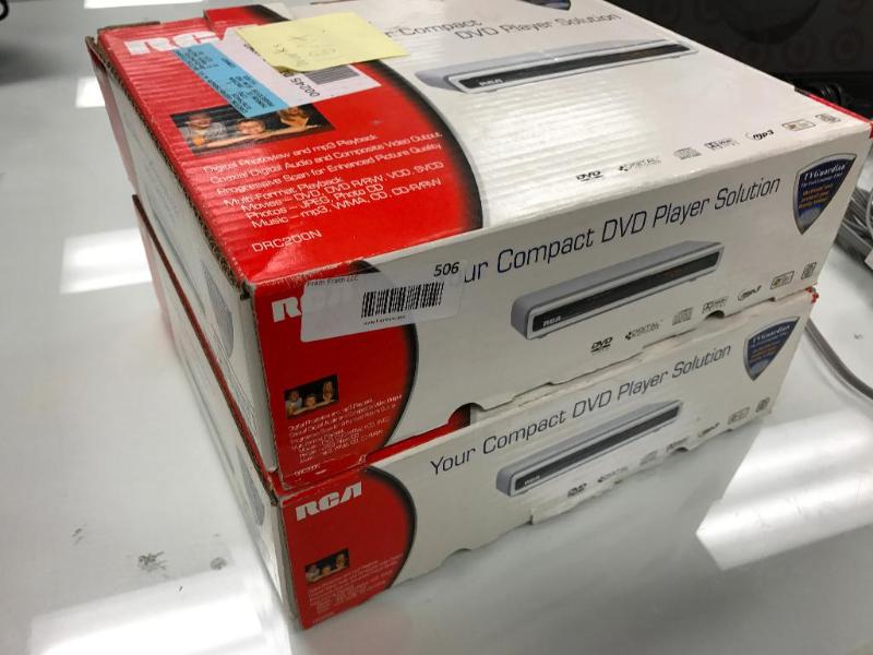 lot 143 image: (2) RCA Compact DVD Player Station.  UPC...