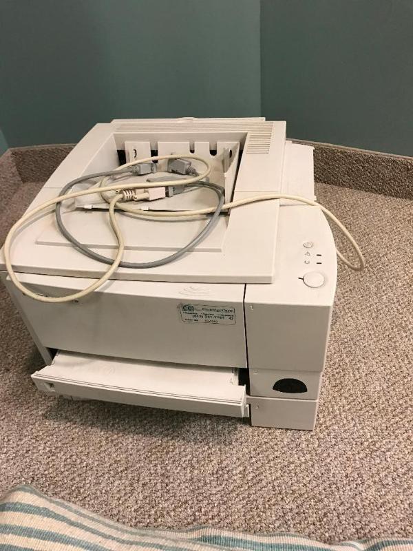 lot 153G image: HP LaserJet 2100TN...