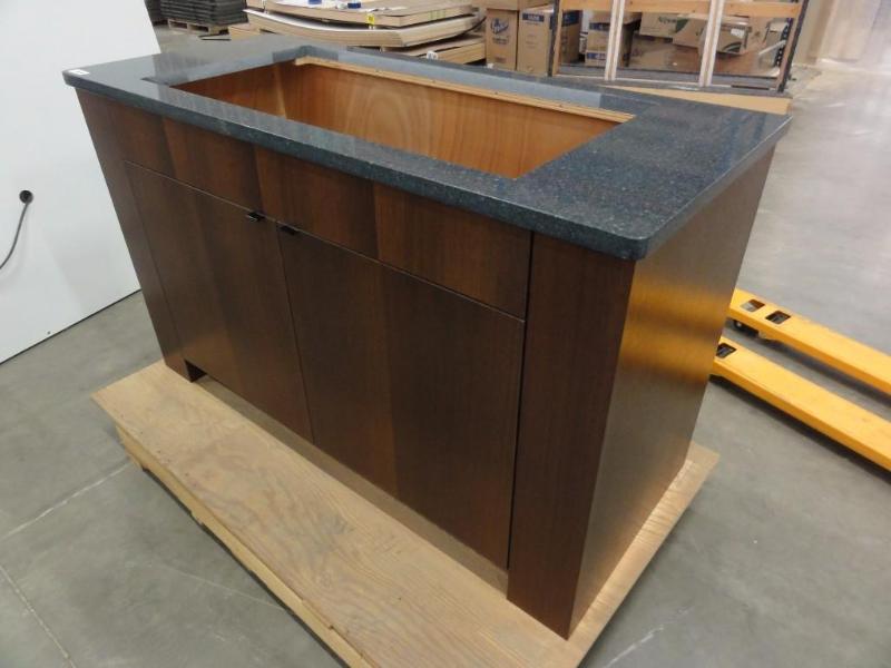 lot 90 image: Custom Cook Top Cabinet with stone type top. ...