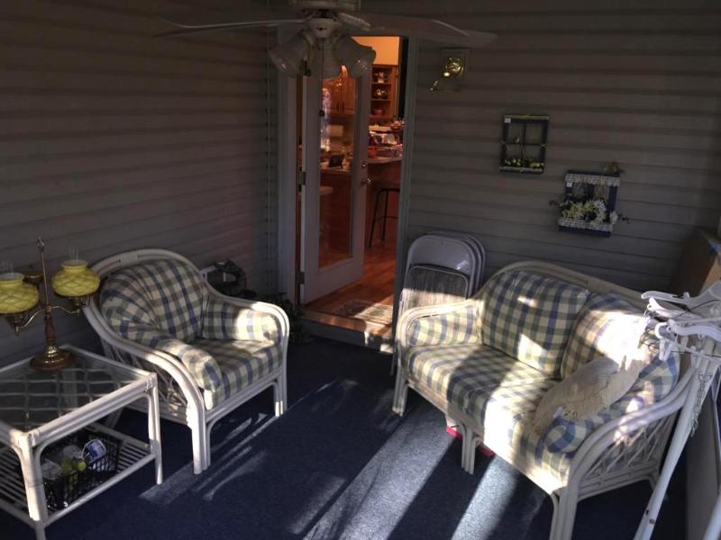 lot 122 image: Rattan Love seat, & matching table and ch...