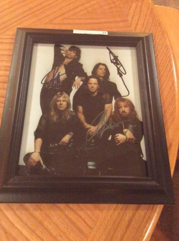lot 14 image: Print of Signed Aerosmith Photograph by All Original Members