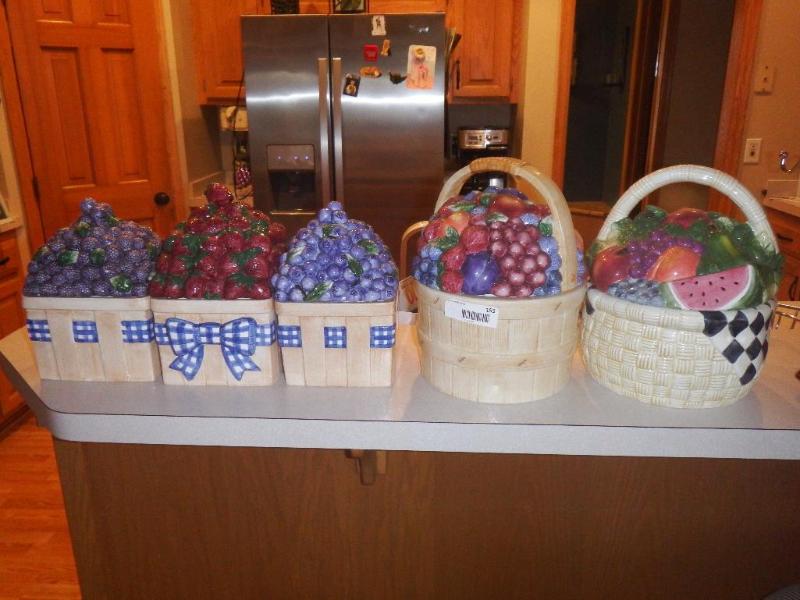 lot 155 image: Decorator Pottery Decanters with fruit theme....