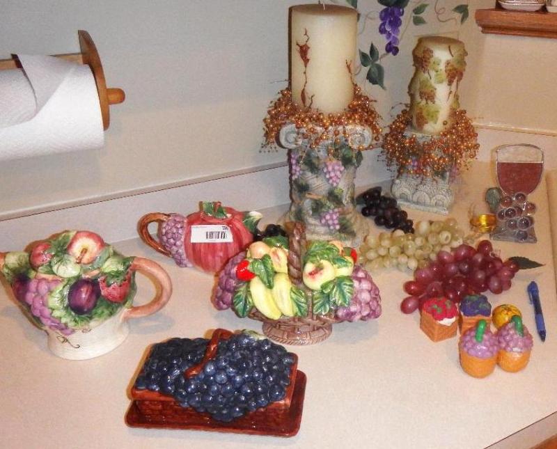 lot 156 image: Fruit motif porcelain tea pots, covered dishe...