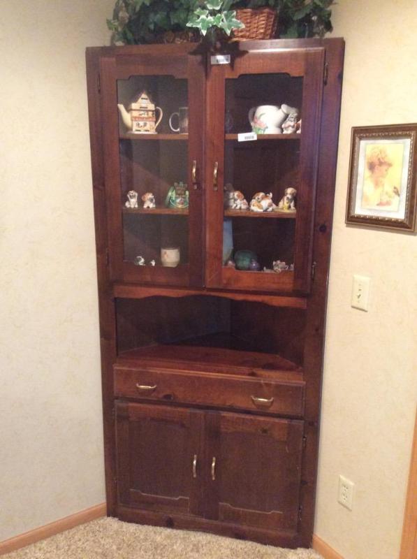 lot 42 image: Walnut Looking Corner Hutch (contents NOT included)