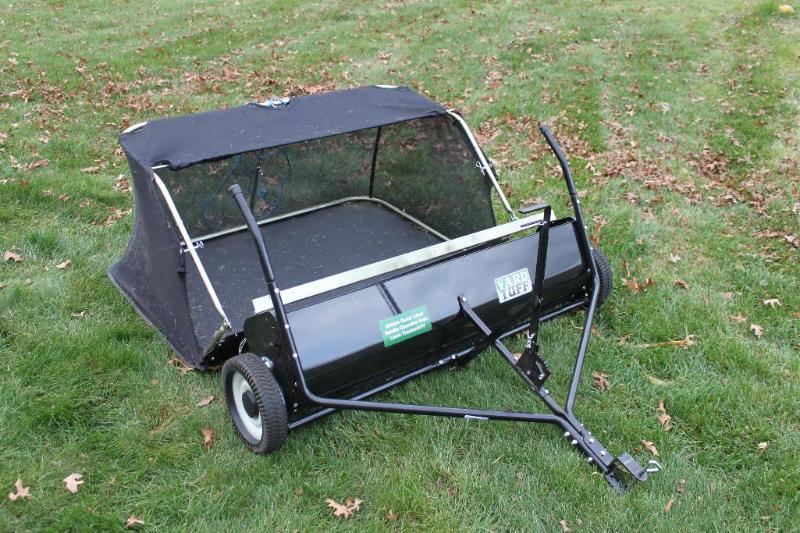lot 57 image: Yard Tuff pull behind tractor Lawn Sweeper. P...