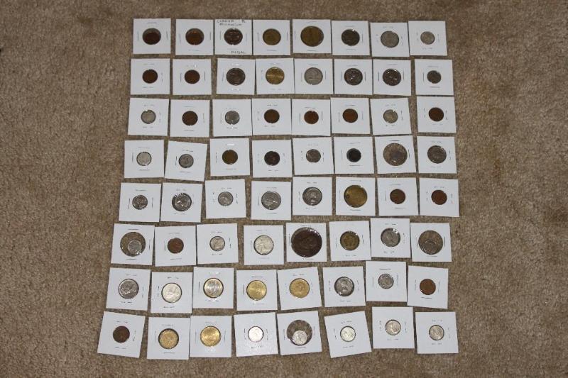 lot 95A image: Large group of foreign coins in black box...