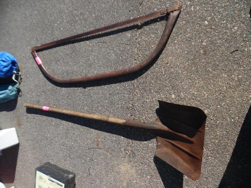 Saw and shovel