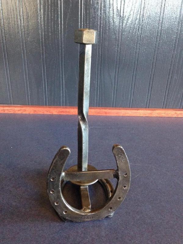 Horse shoe paper towel holder