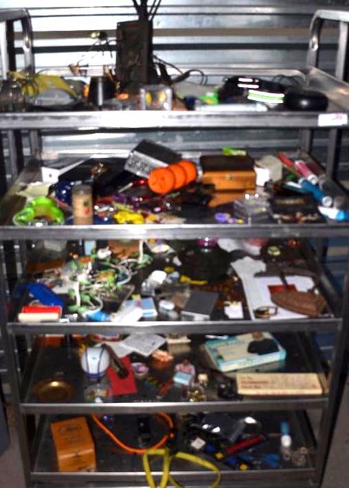 All contents of rolling cart. There are a num...