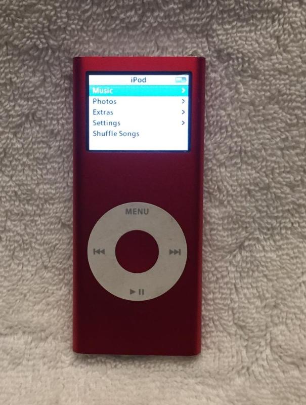 Red Apple IPod Model no. A1199. 4 GB, serial ...