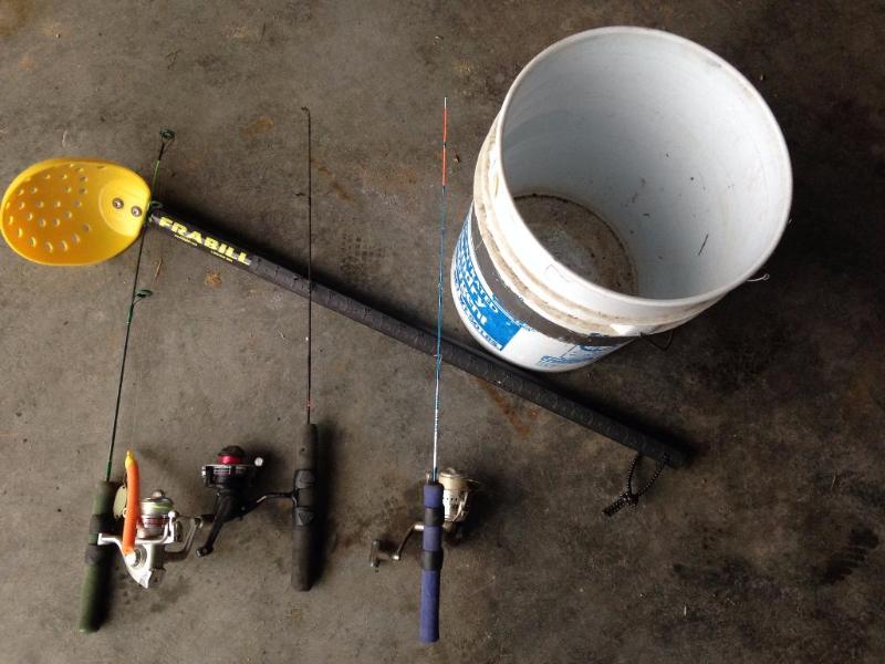Ice fishing poles, ice scoop and bucket