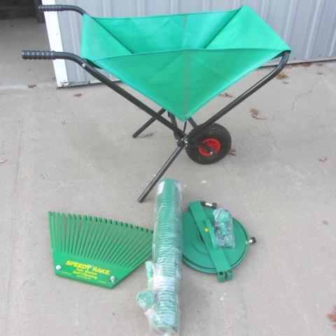 lot 29 image: Wheelbarrow, Hoses