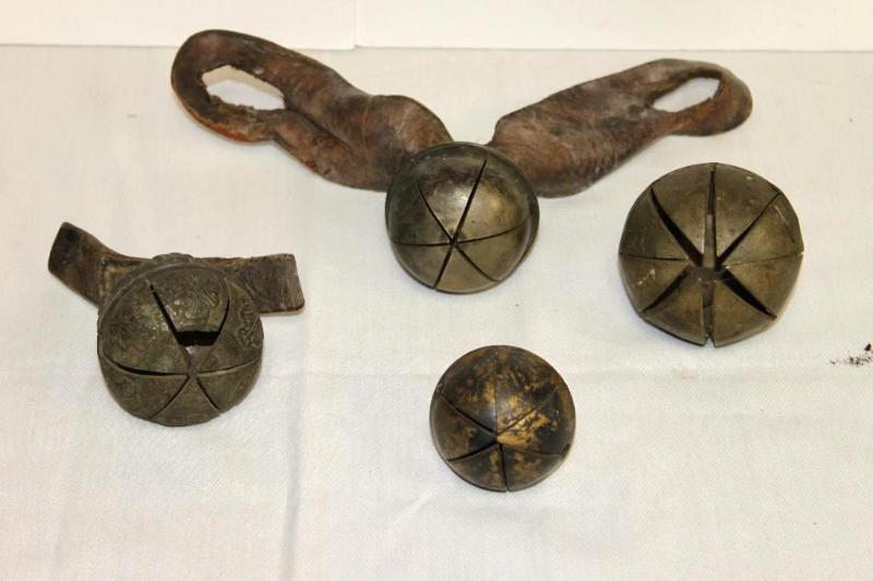 lot 63 image: Antique Cow Bells, some on Leather Straps. Pl...