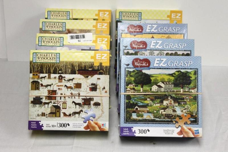 lot 73 image: 8 EZ Grasp 300 pc&nbspPuzzles - Various sc...