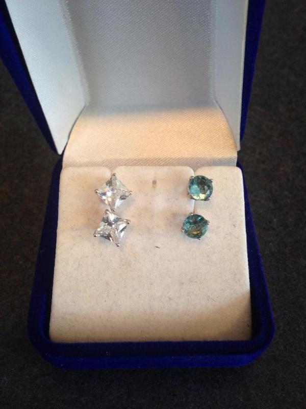 Two pairs of silver pierced earrings. &nbspO...