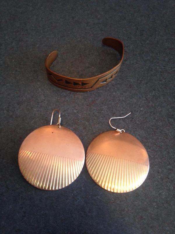 A solid copper cuff bracelet made by Bell Tra...