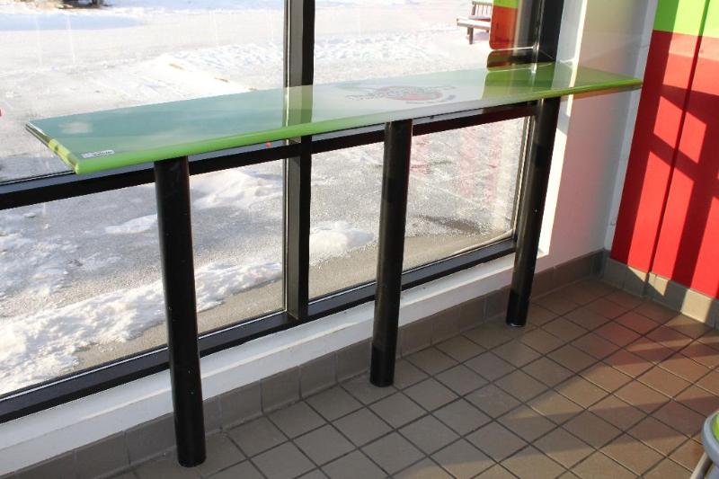 Green bar table 16x43x84. Poles are set in th...