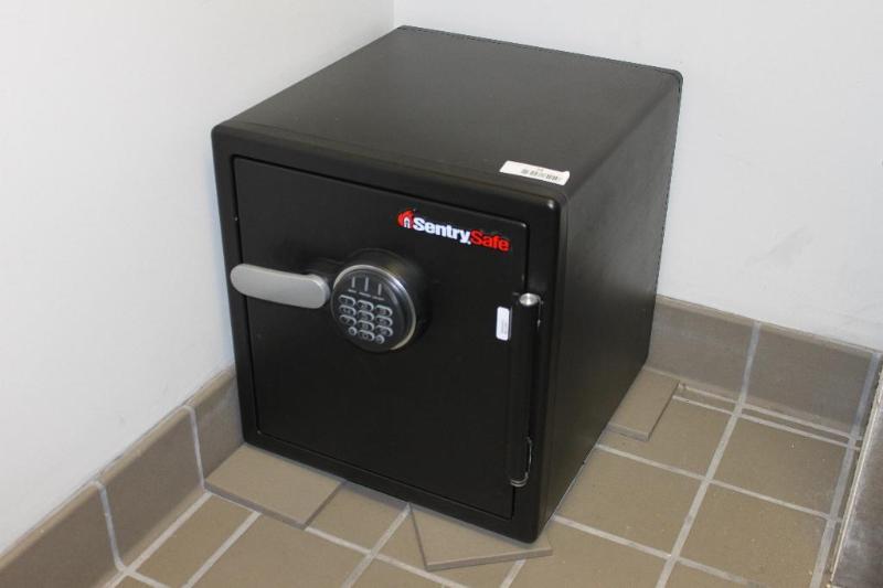 Sentry Safe 16x17x18. It is not bolted to the...