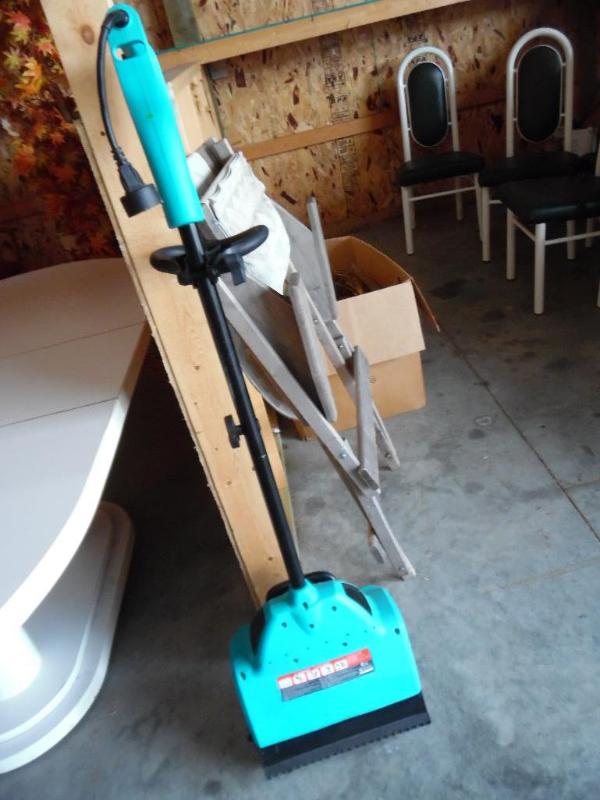 lot 9 image: Sno Works electric snow shovel