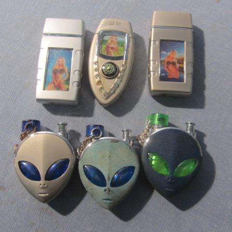 lot 192 image: Alien, Playboy Butane Lighters