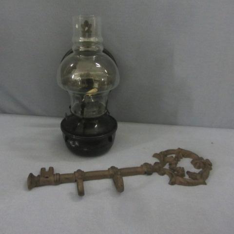 lot 233 image: Cast Iron Key Holder, Kerosene Lamp
