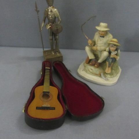 lot 95 image: Mini Guitar, Rockwell Figure