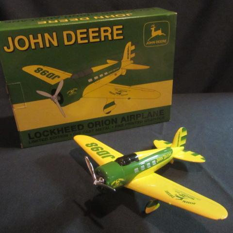 lot 57 image: John Deere Collector Airplane Bank
