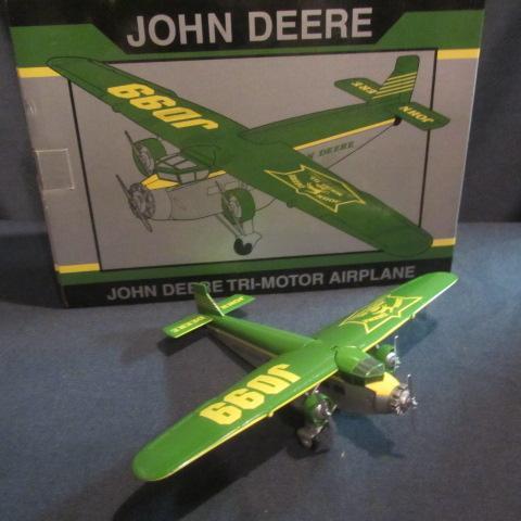 lot 58 image: John Deere Collector Airplane Bank