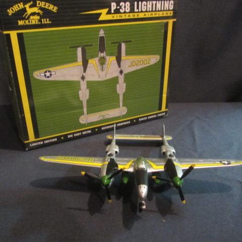 lot 61 image: John Deere Collector Airplane Bank