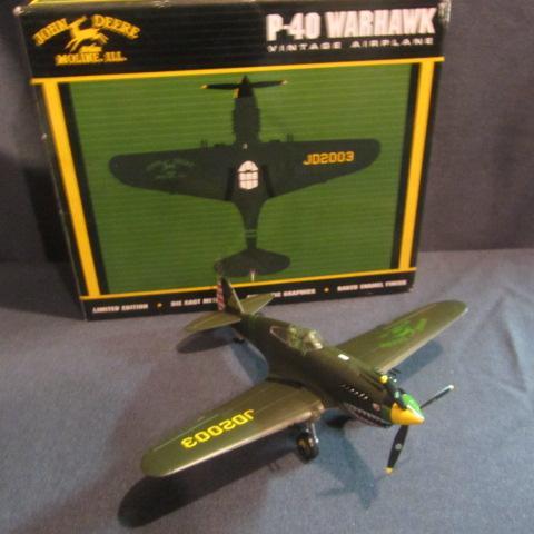 lot 62 image: John Deere Collector Airplane Bank