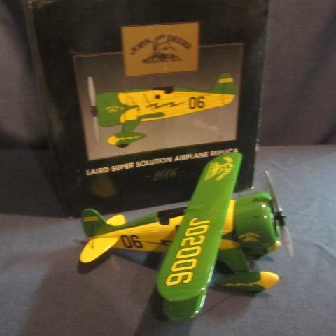 lot 65 image: John Deere Collector Airplane Bank