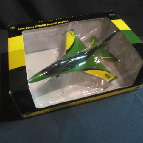 lot 67 image: John Deere Collector Airplane Bank