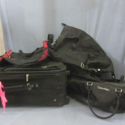 lot 124 image: Rolling Suitcase, Duffle Bags