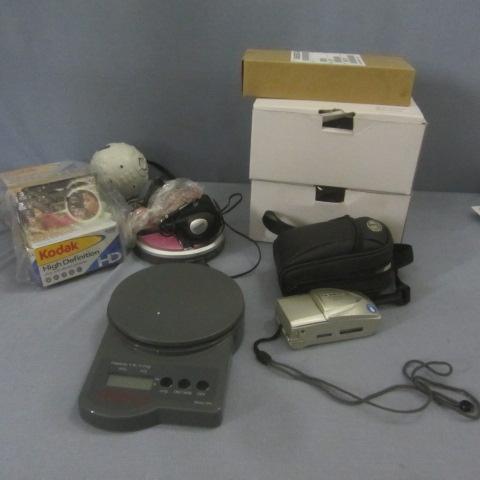 lot 68 image: Camera,  Film, Headphones, Scale