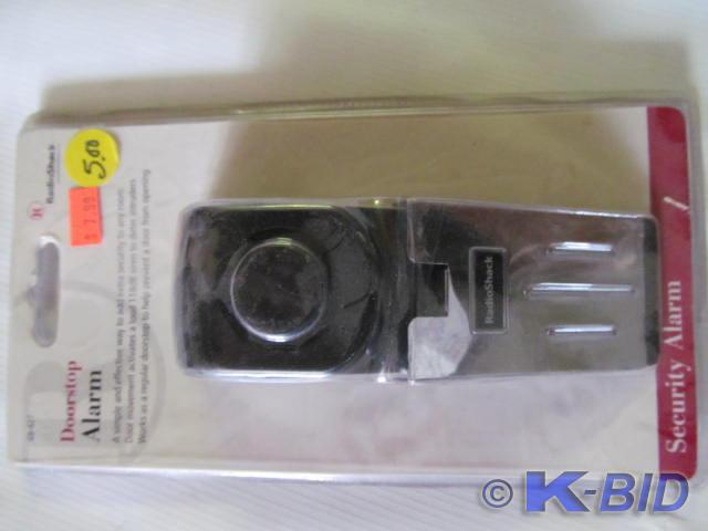Brand new in box doorstop alarm.
