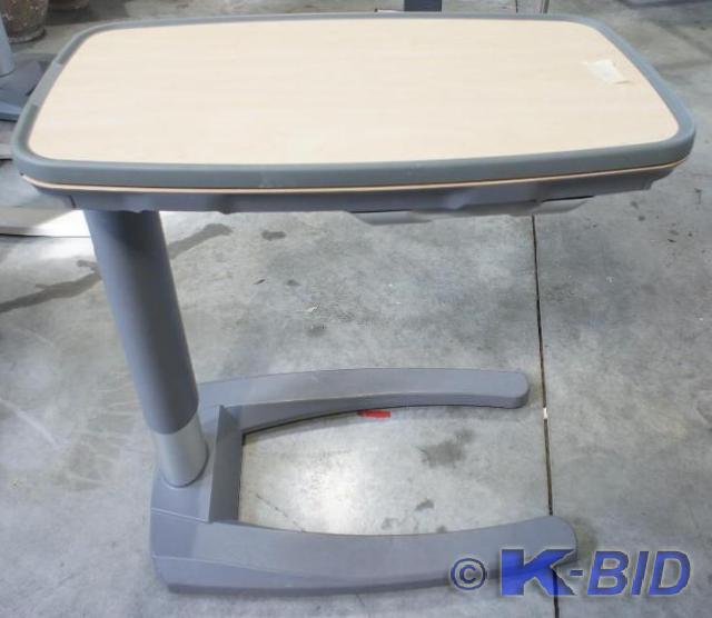 lot 14 image: Used  Stryker Overbed Table    MSRP...