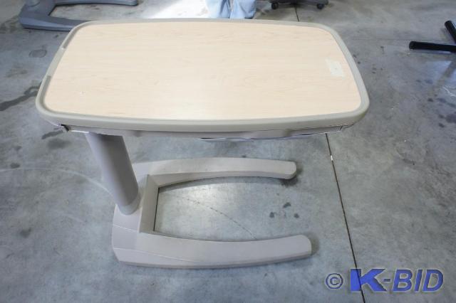 lot 15 image: Used  Stryker Overbed Table    MSRP...