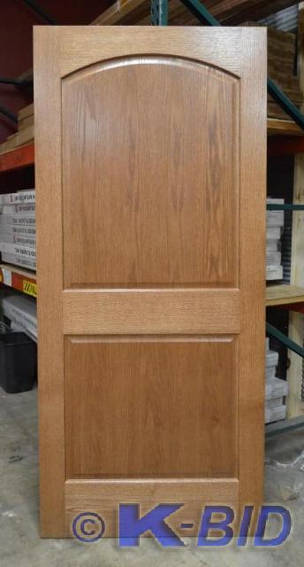 lot 79 image: 36 Prefinished Oak 2-panel arch Go...