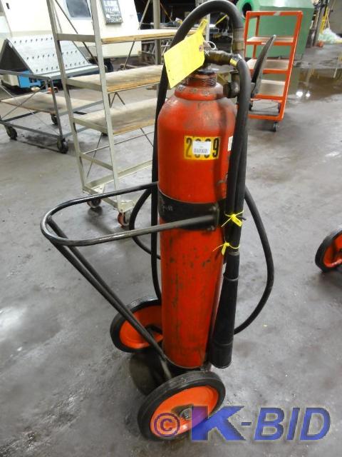 lot 252 image: CO2 Fire Extinguisher on Rolling Ca...