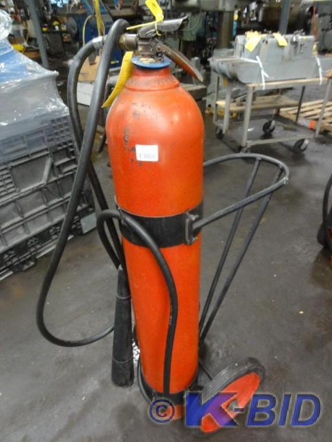 lot 253 image: CO2 Fire Extinguisher on Rolling Ca...