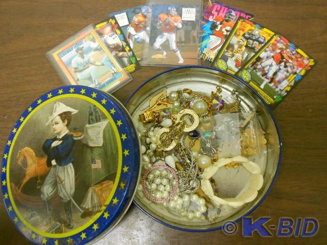 Tin full of necklaces bracelets, pi...