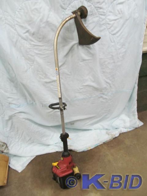 lot 133 image: Homelite String Trimmer - Gas