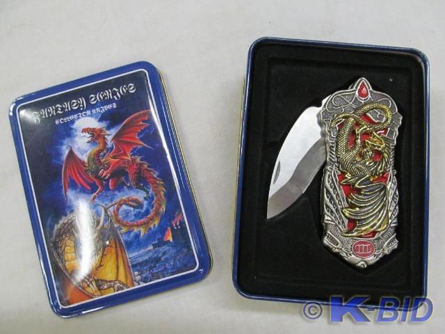 lot 218 image: Knife in Tin Box